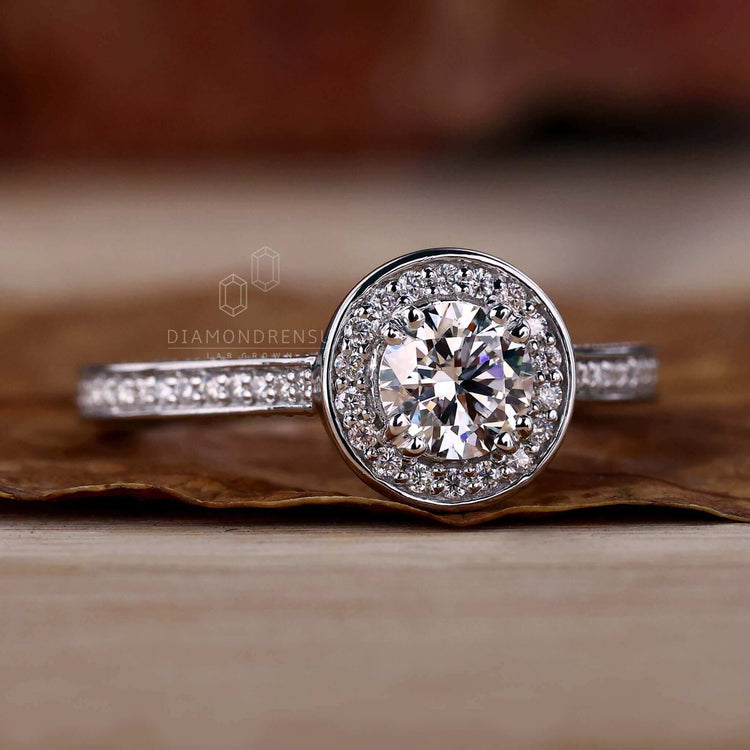 Pave diamond ring crafted with a round ring diamond and bezel setting for a modern look.