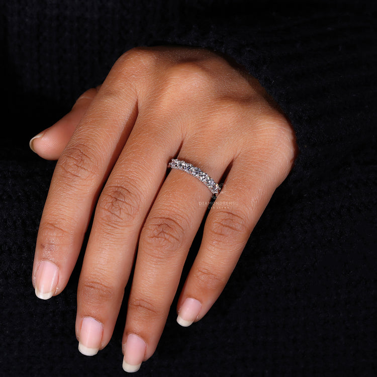 Round cut diamond half eternity ring.