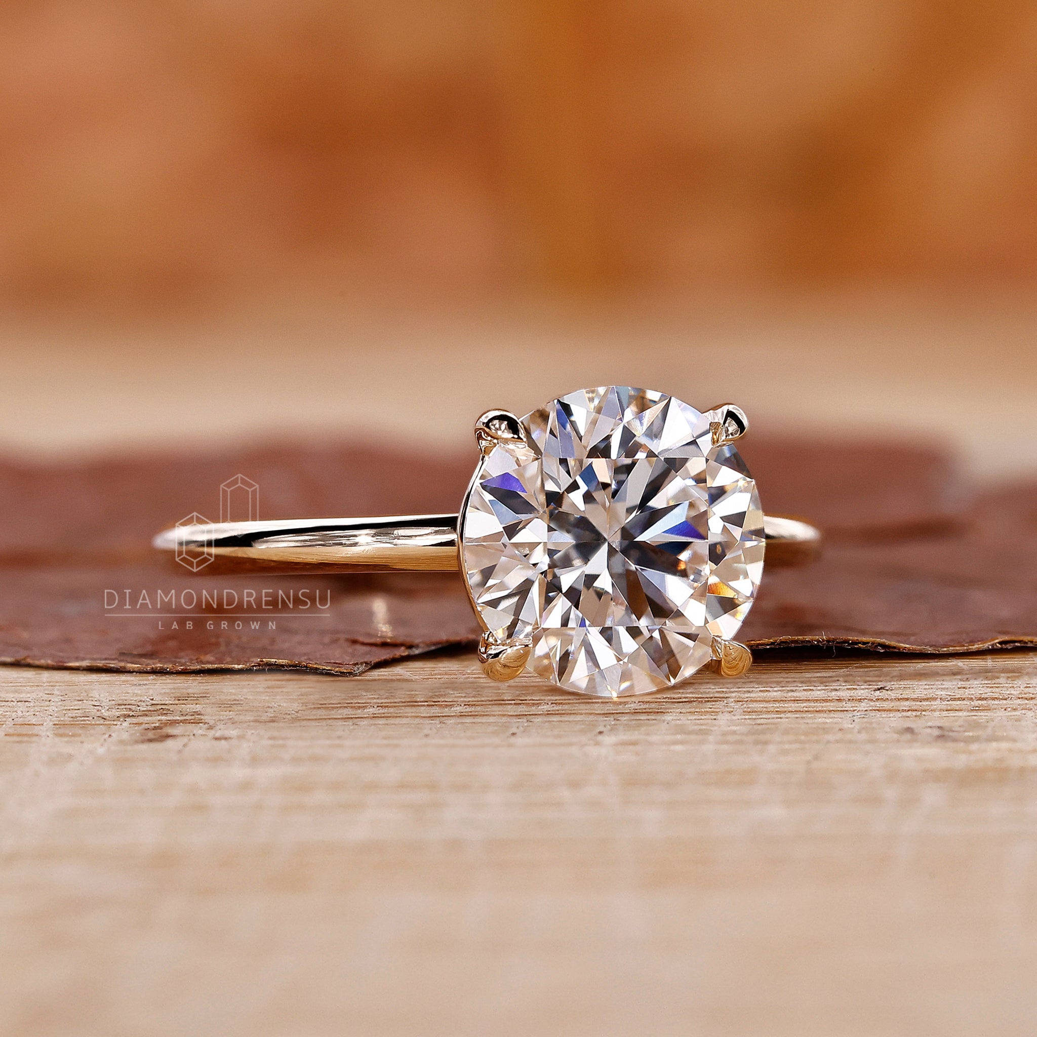 Classic UK engagement ring with a 4 claw setting.