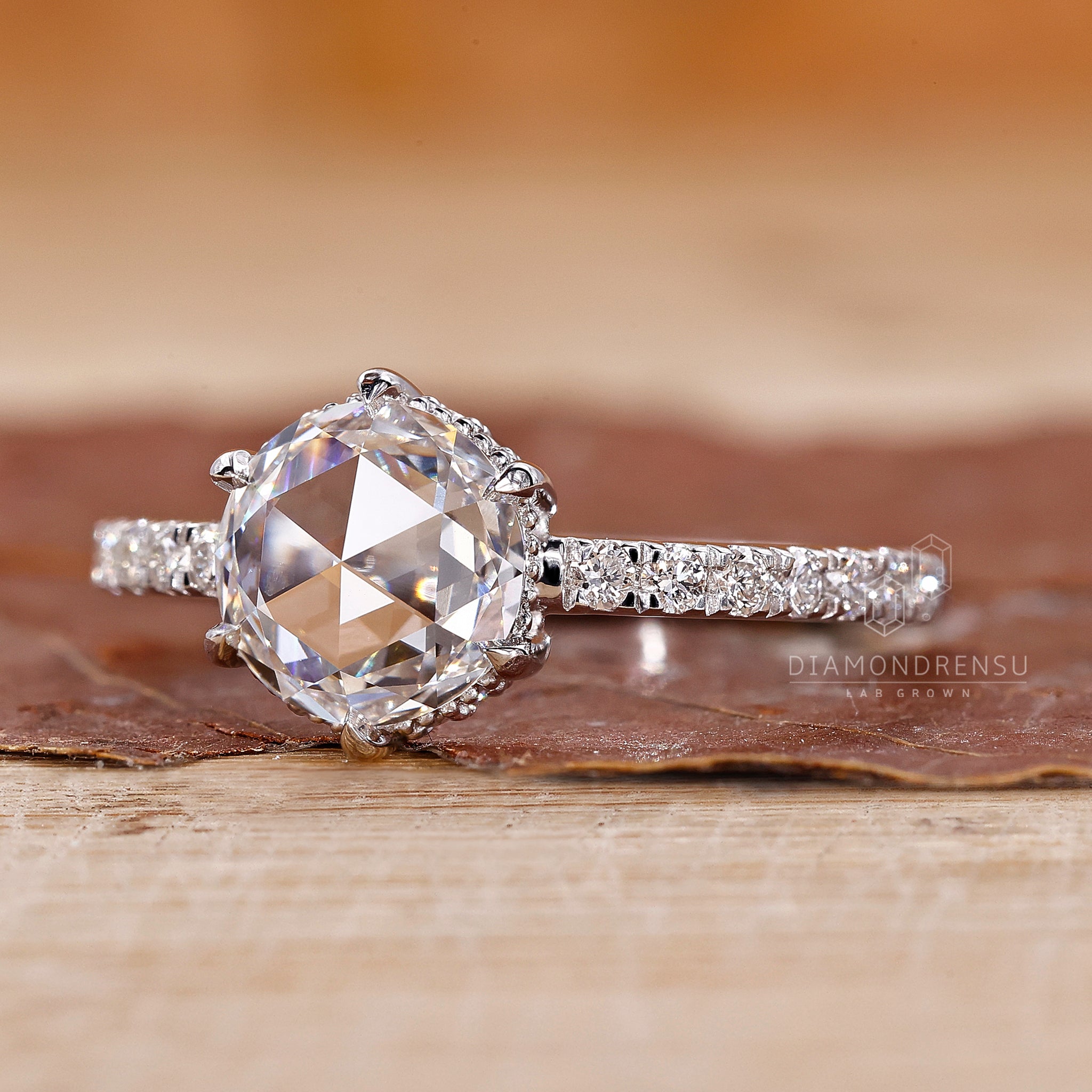 Handmade ring with pave setting and hidden halo diamond accents.