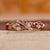 Nature inspired wedding band with leaf detailing and round cut diamonds. Nature inspired wedding band with leaf detailing and round cut diamonds.