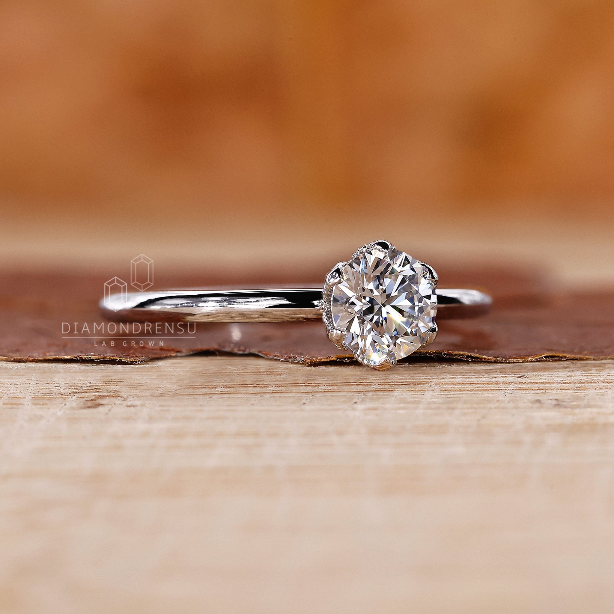 White gold engagement ring designed as solitaire engagement ring.