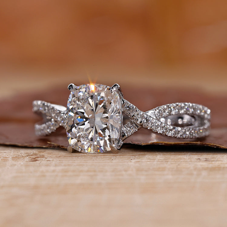 IGI certified elongated cushion cut diamond ring.