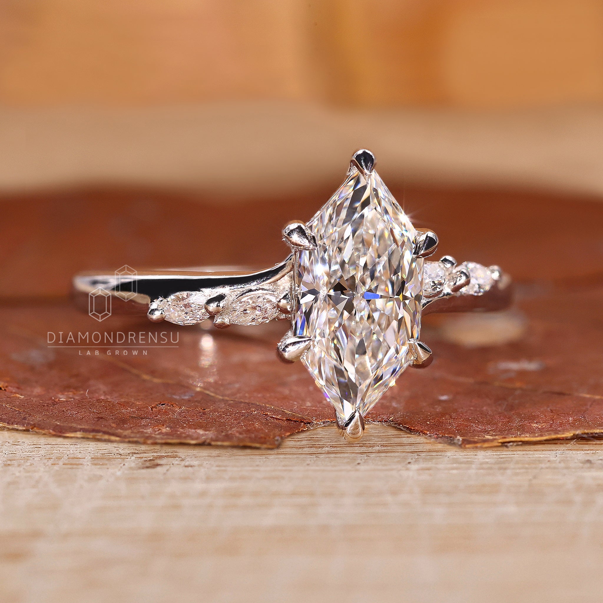 6 claw prong setting on white gold ring.