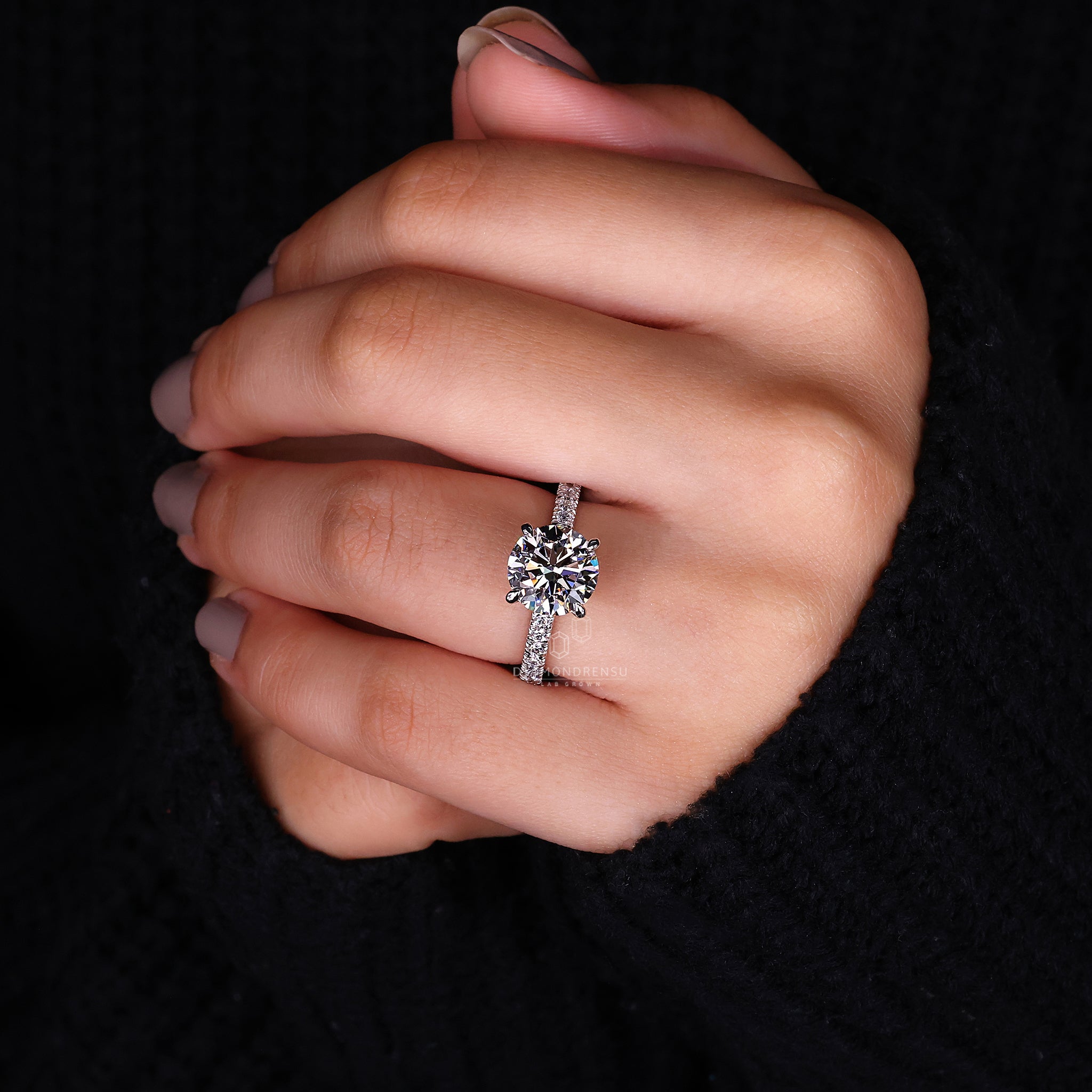 Custom engagement ring with IGI certified diamond.