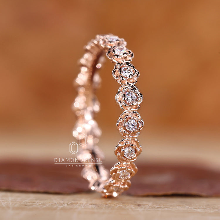 Eternity wedding band with flower style
