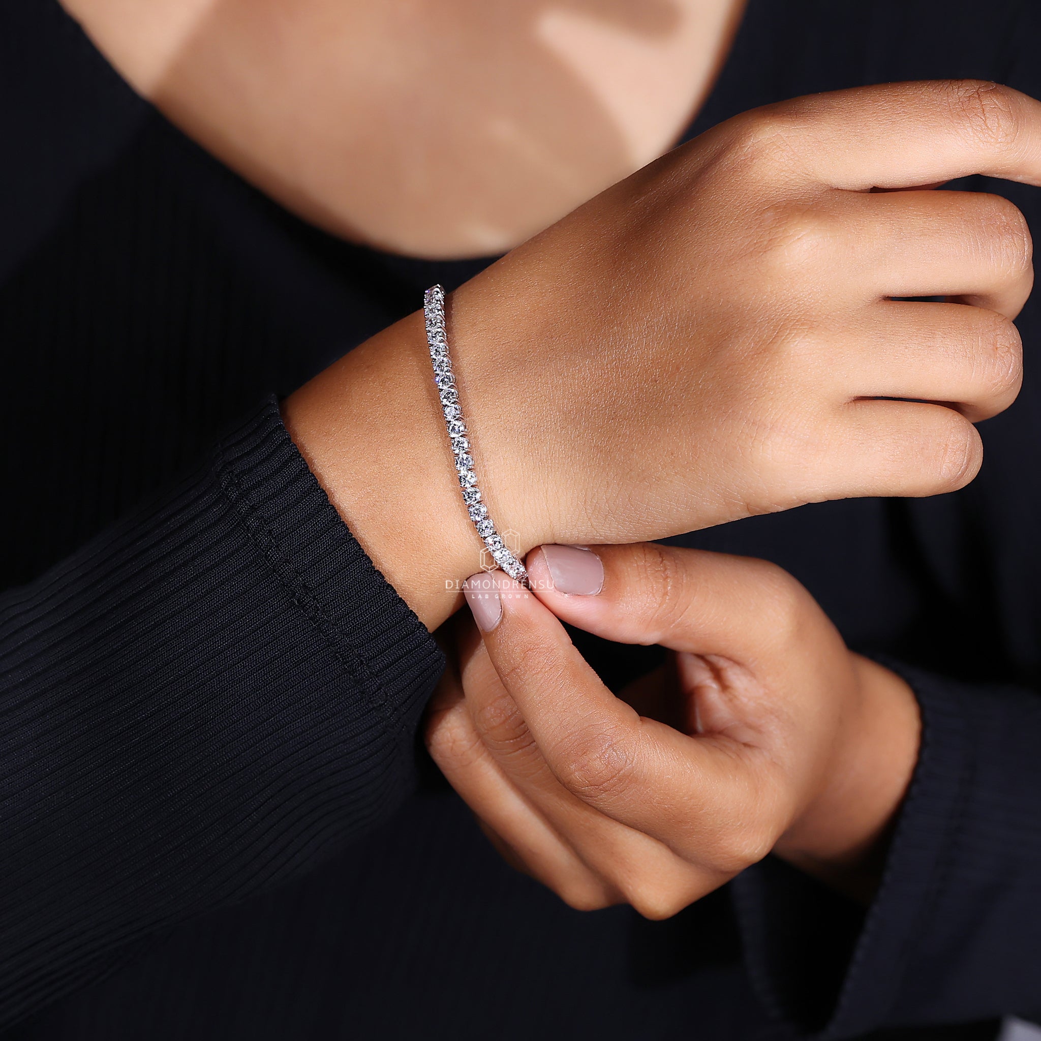 Handmade jewellery piece featuring a round diamond tennis bracelet.