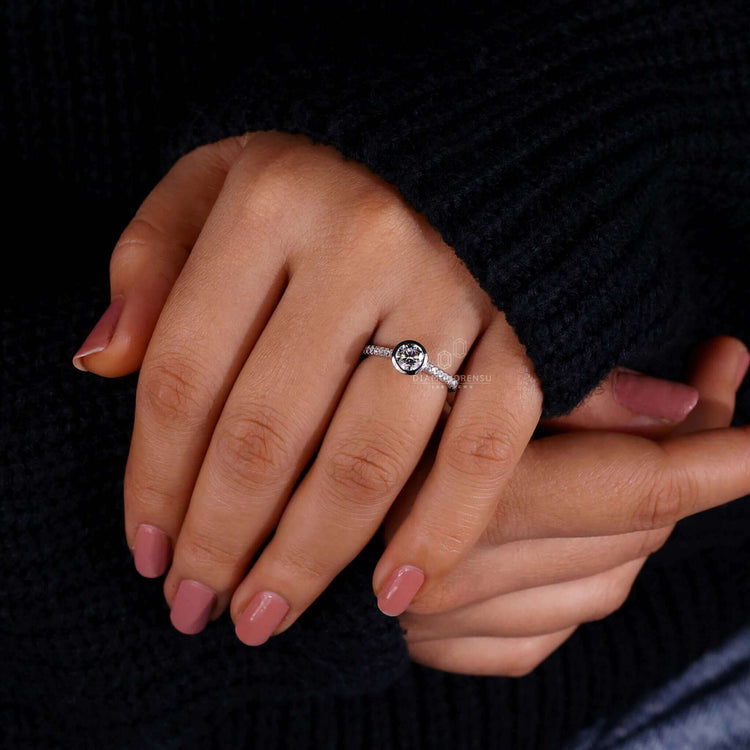 Engagement ring with pave featuring a bezel ring design and handmade jewelry, ideal for modern brides in the UK.