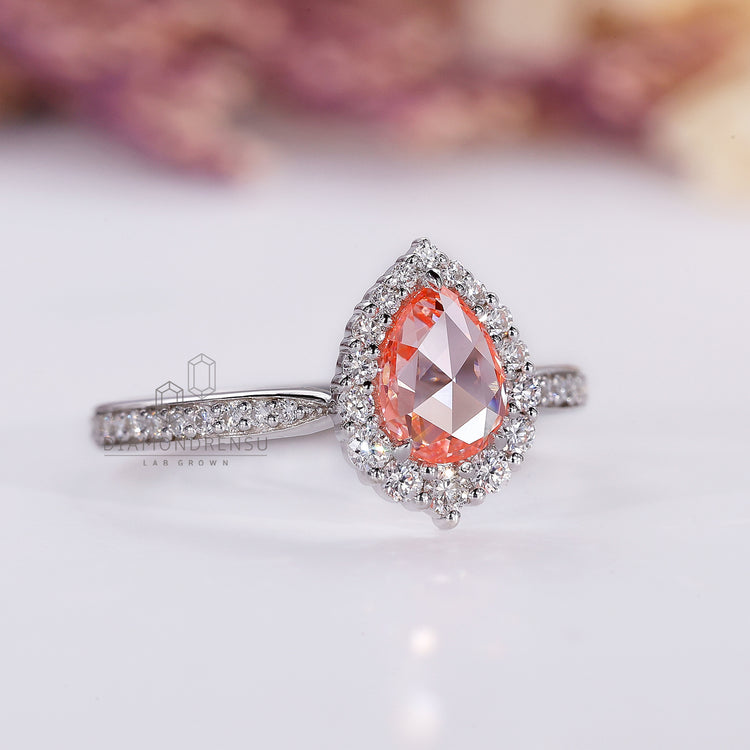 Handmade ring with pear rose cut sapphire and pave setting.