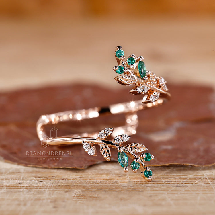 Rose gold wedding band with handmade detailing and prong setting.