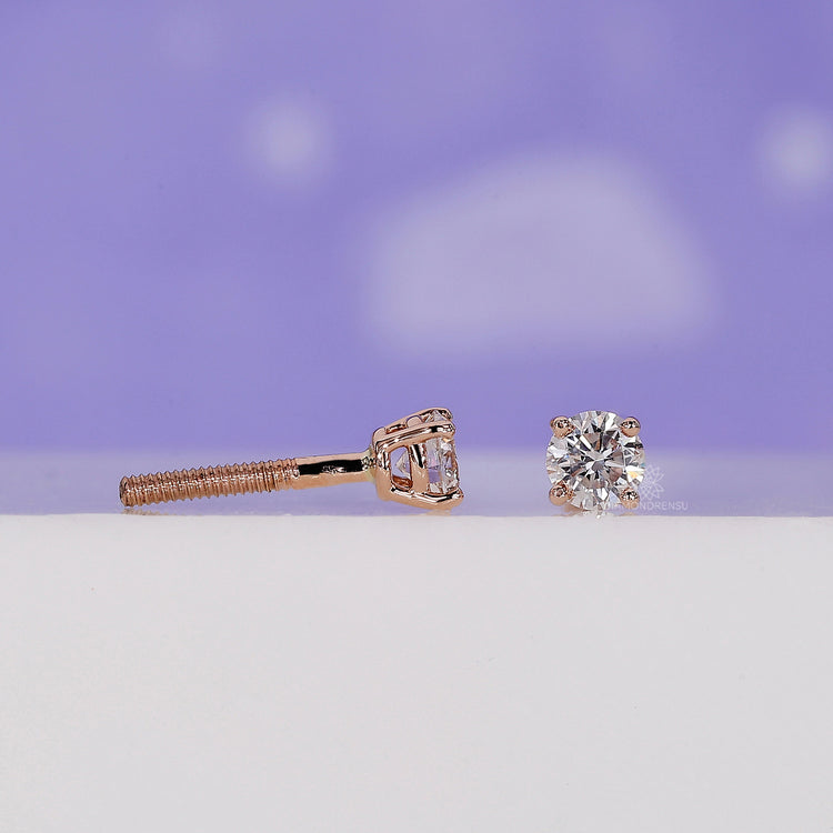 Screw back earrings with round cut diamonds.