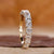 Asscher cut diamond wedding band in yellow gold.
 Asscher cut diamond wedding band in yellow gold.