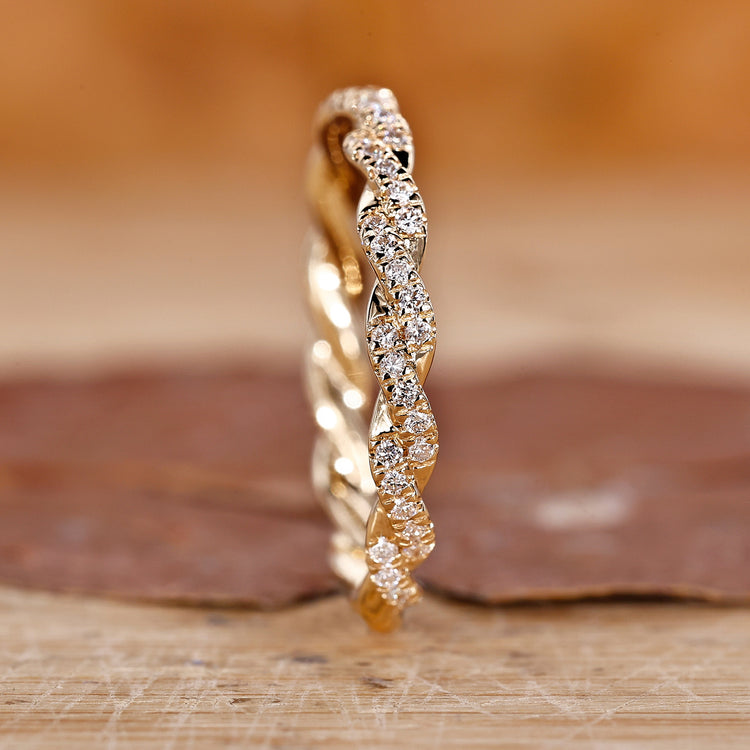 Twisted diamond wedding band in yellow gold.