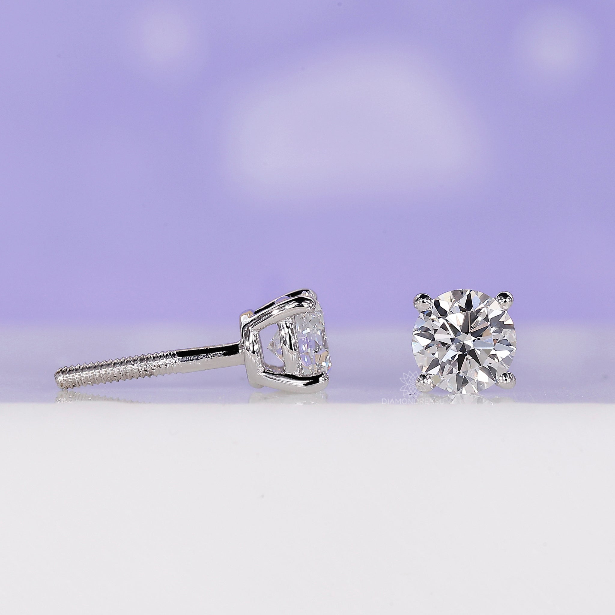 Lab grown diamond earrings in white gold with secure prong settings.