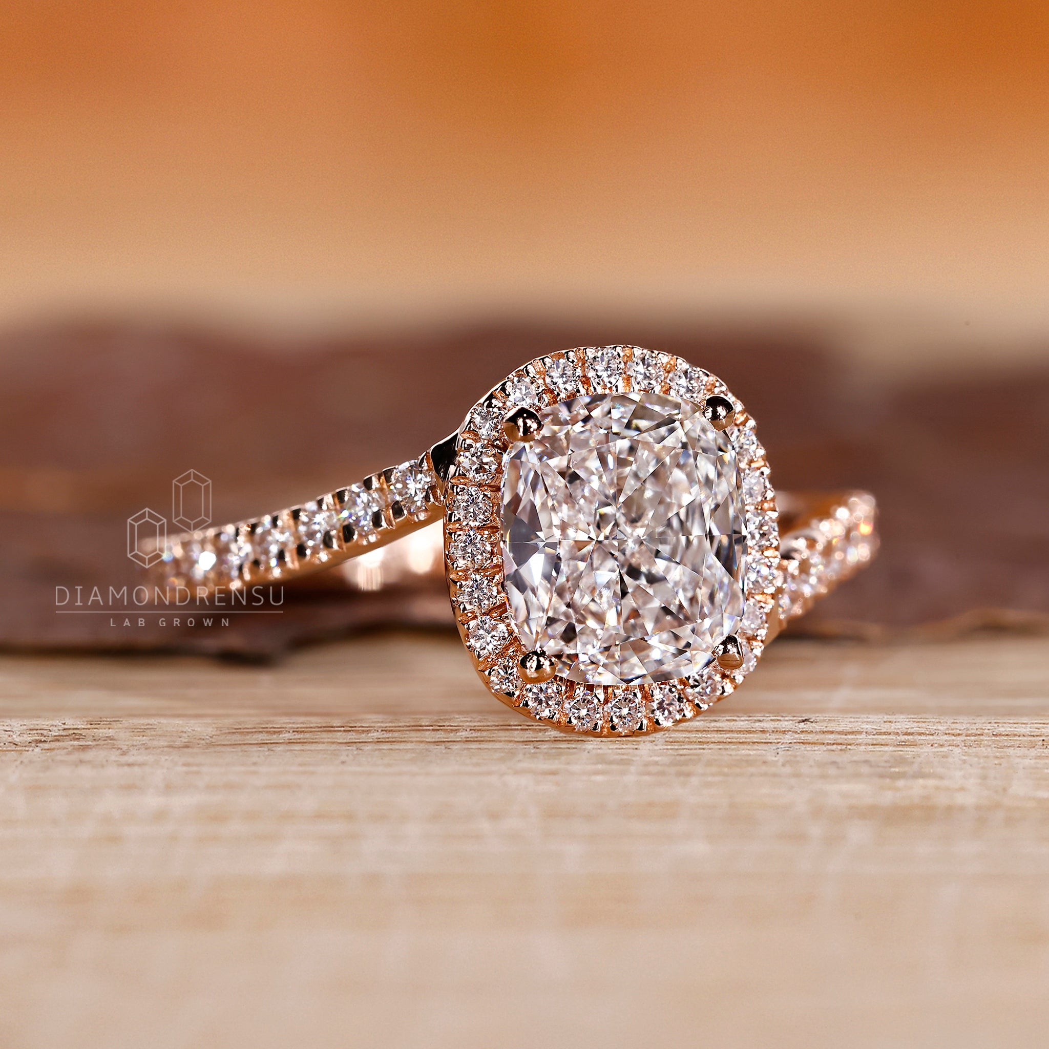 Bypass setting ring with four prong cushion diamond.