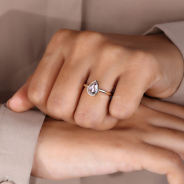 Pear shaped solitaire diamond ring for proposals