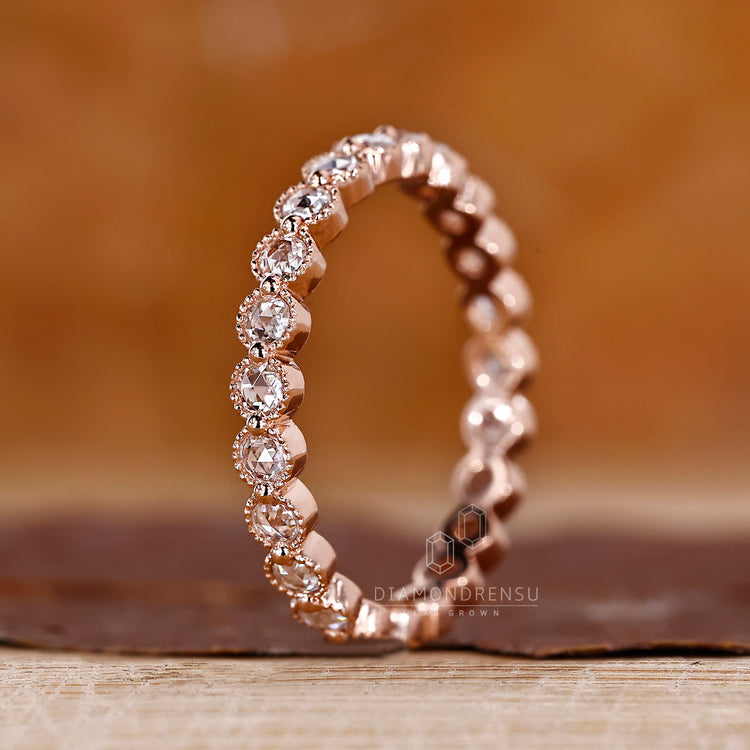 Diamondrensu UK wedding band in rose cut style.
