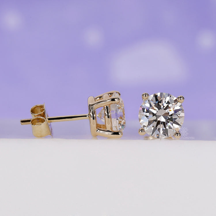 Diamondrensu UK yellow gold earrings.