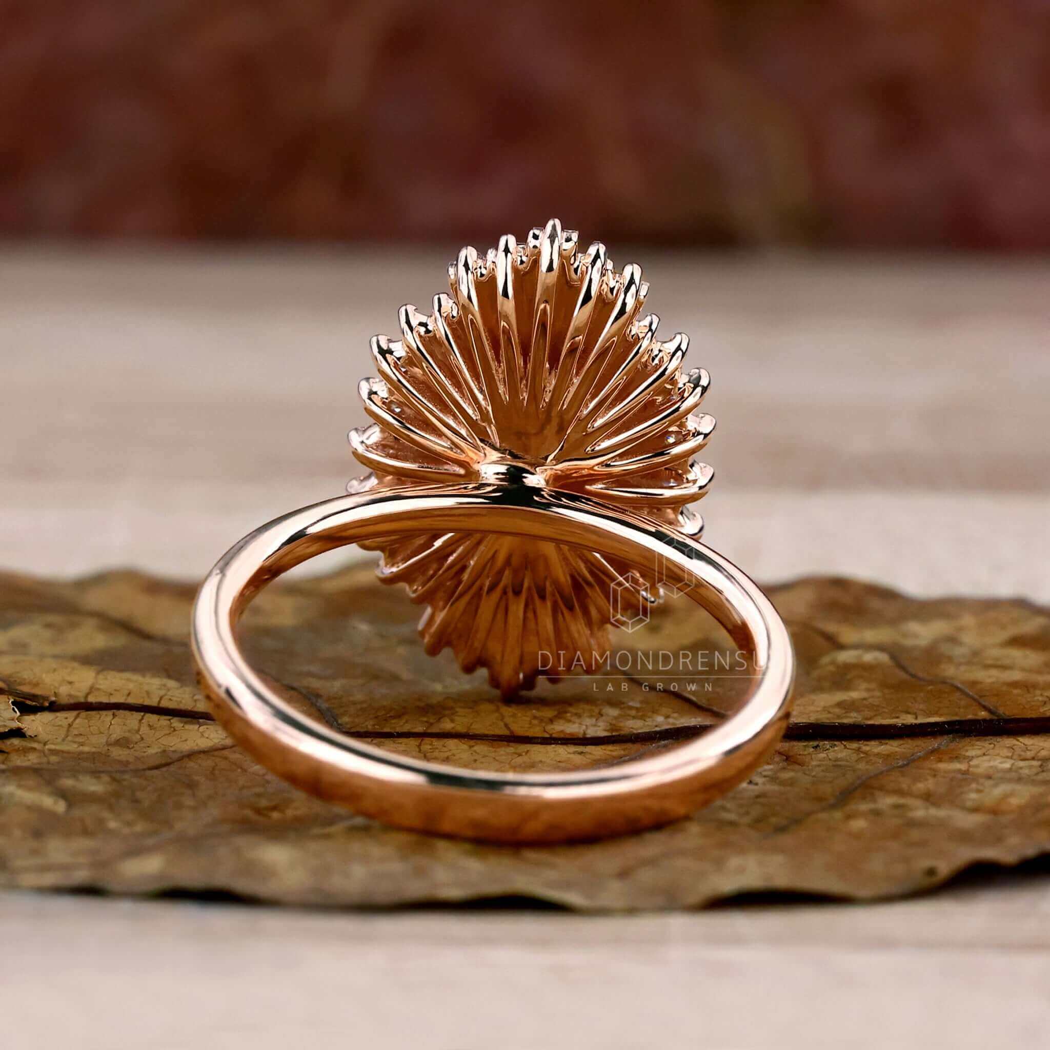 Engagement ring with side stones and a rose gold setting for unique style