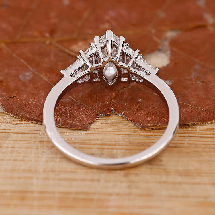 Engage Ring UK offers a white gold 5 stone ring with secure prong setting.