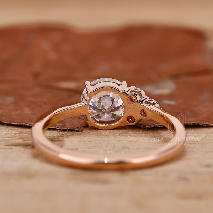Round brilliant cut diamond ring with prong setting.