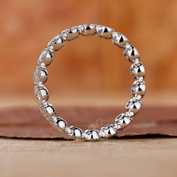 Diamondrensu UK bezel set wedding band.