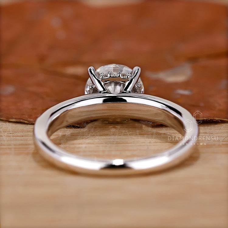 UK engagement ring designed with tapered pave set.
