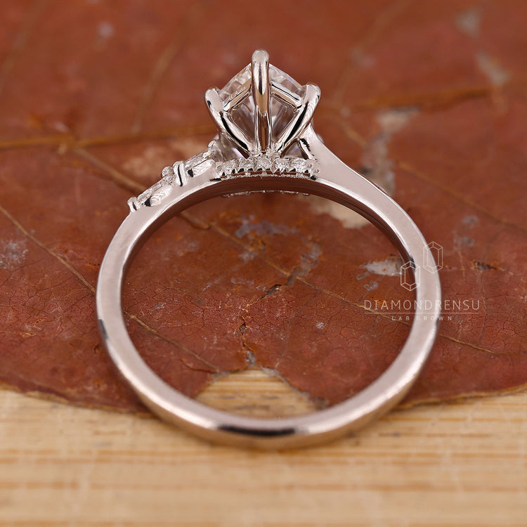 Custom engagement ring designed with 6 claw prong setting.