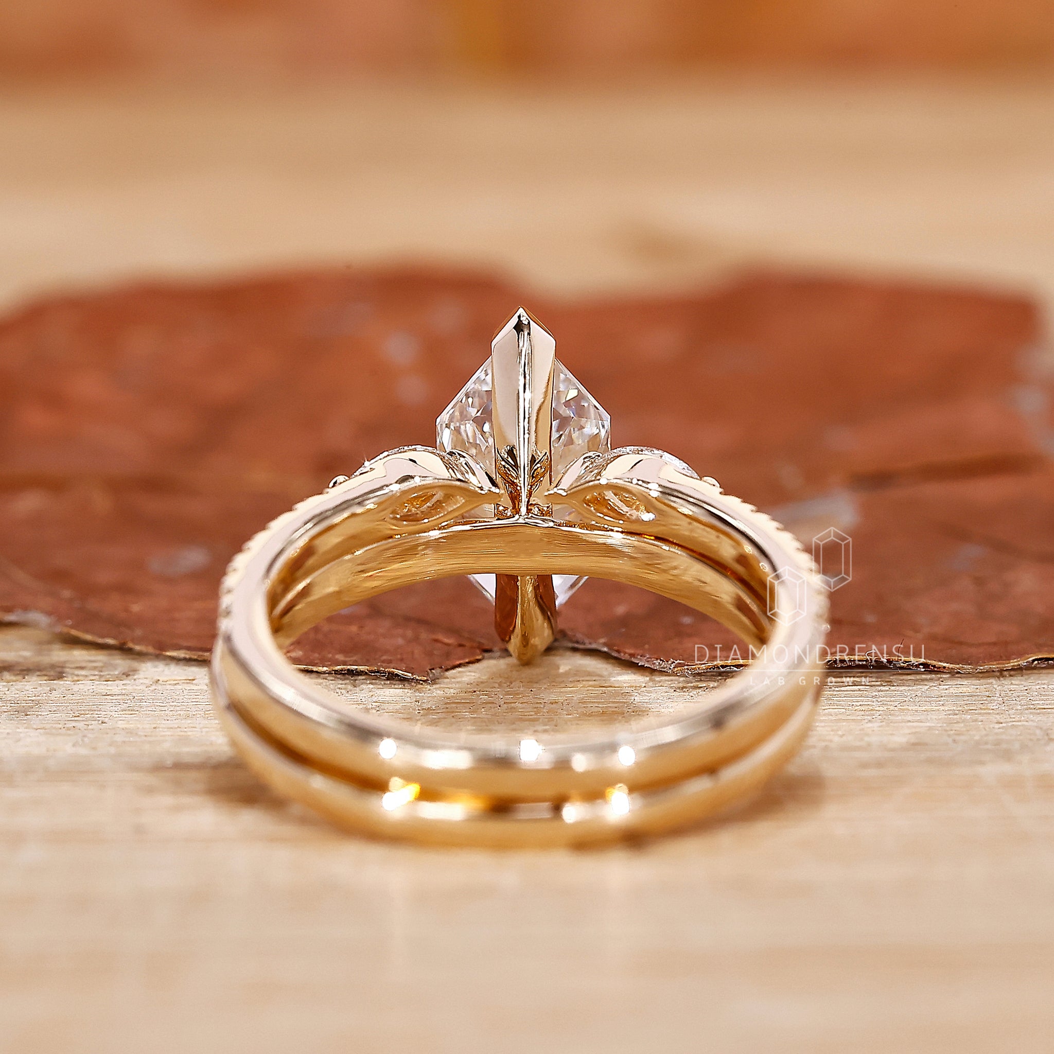 Open gap yellow gold wedding band.