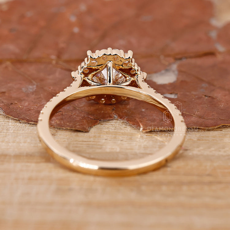 Yellow gold ring with cathedral setting ring detail
