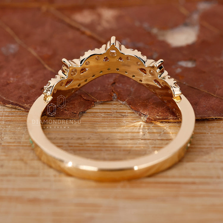 Unique tiara wedding band in yellow gold.