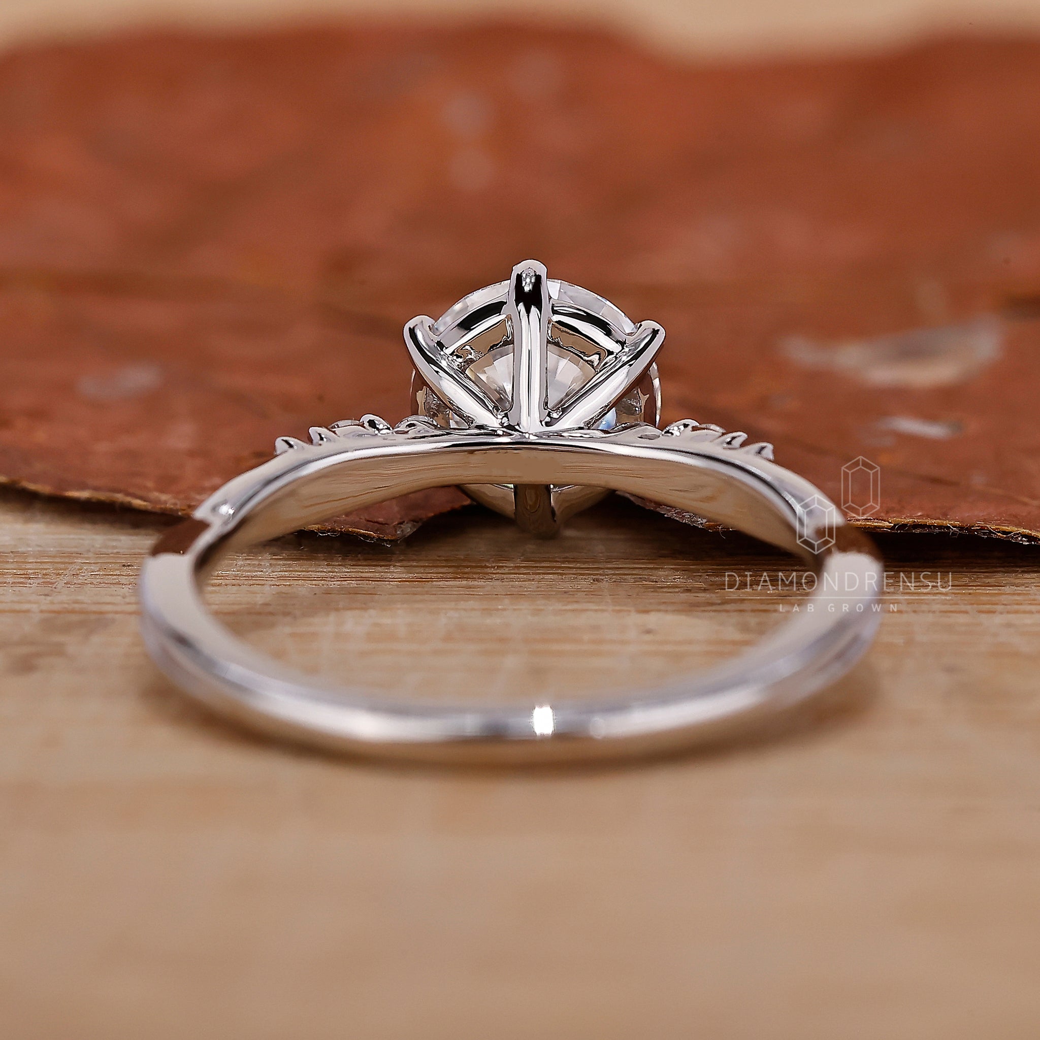 Handmade jewellery featuring a twisted pave ring design.