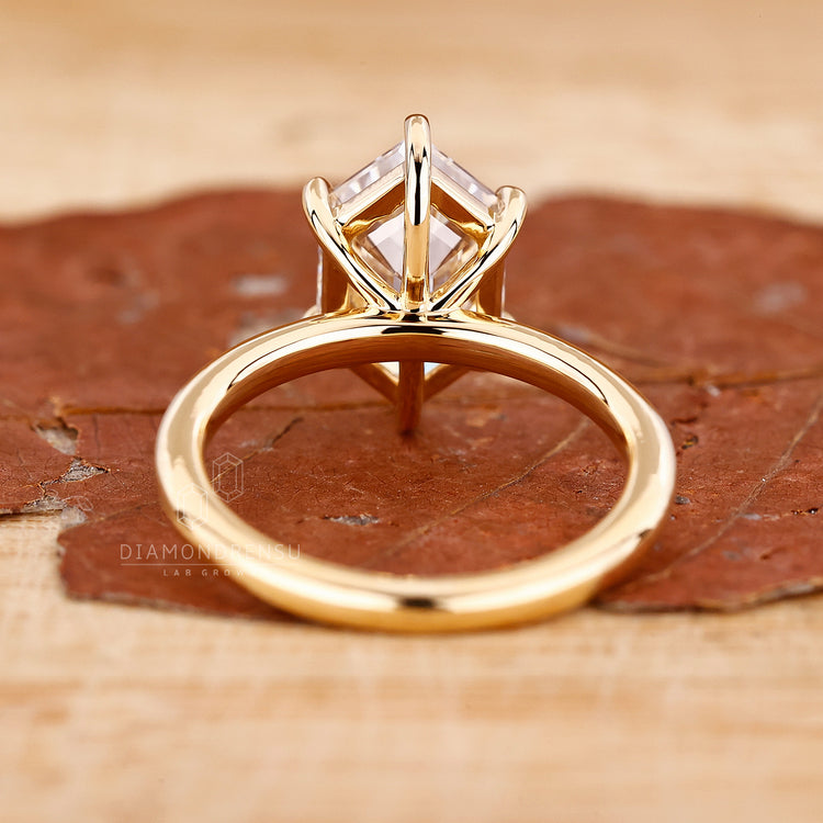 Lab grown diamond ring featuring hexagon cut and classic solitaire style.