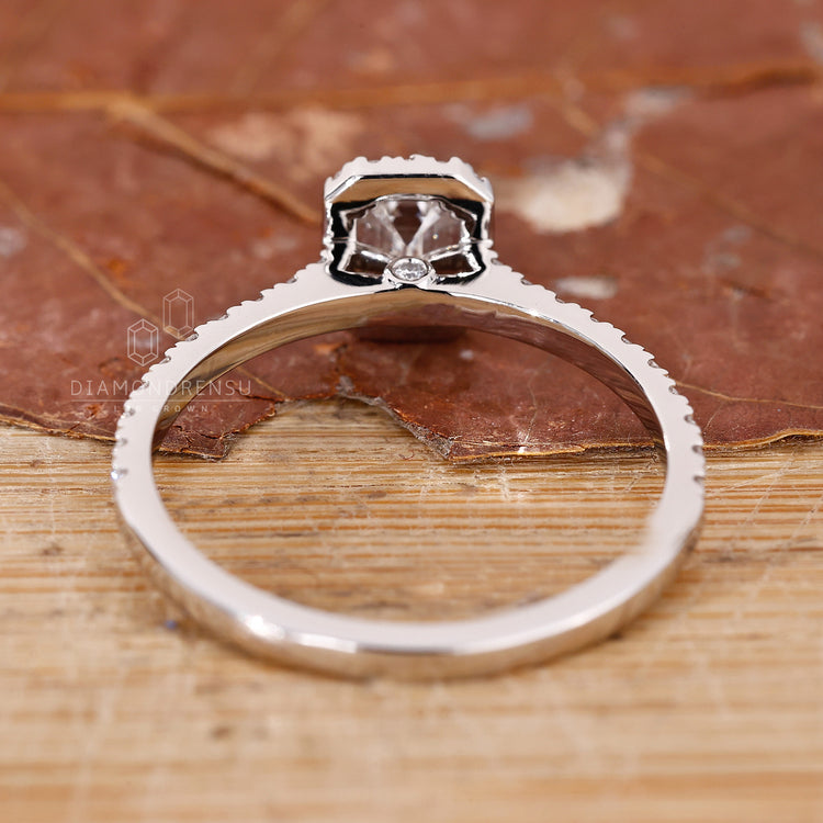 Prong setting used in emerald cut diamond ring.
