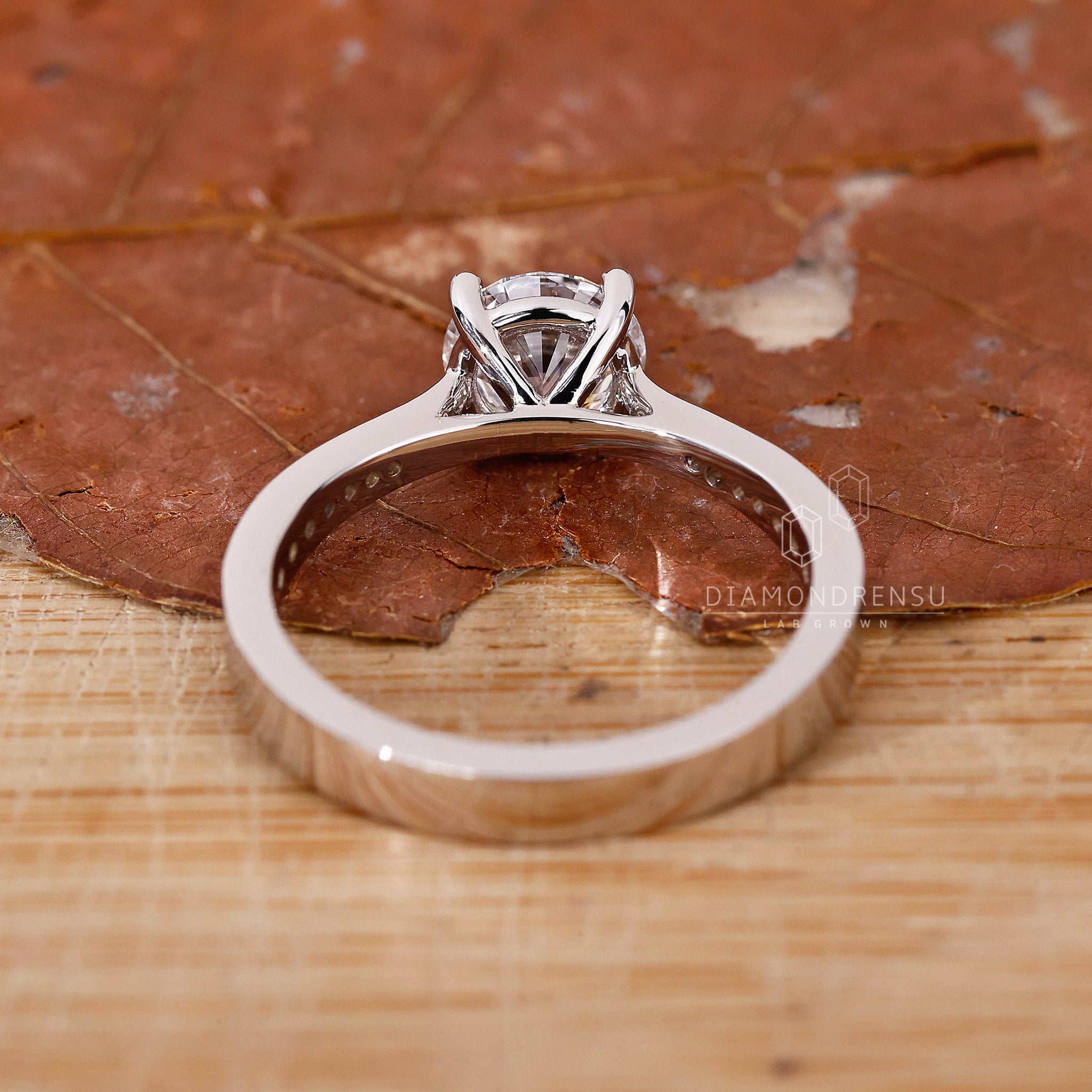 UK engagement ring made with cathedral setting ring.