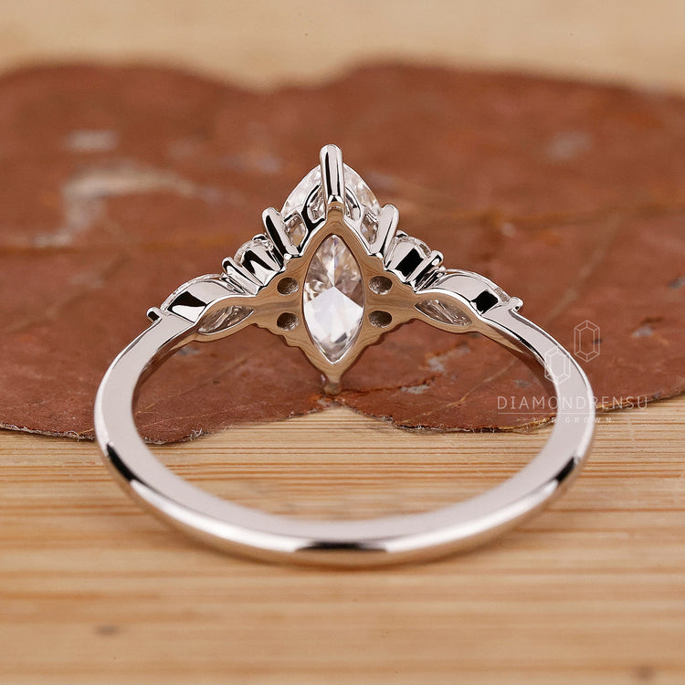 UK engagement ring featuring elegant muse setting.