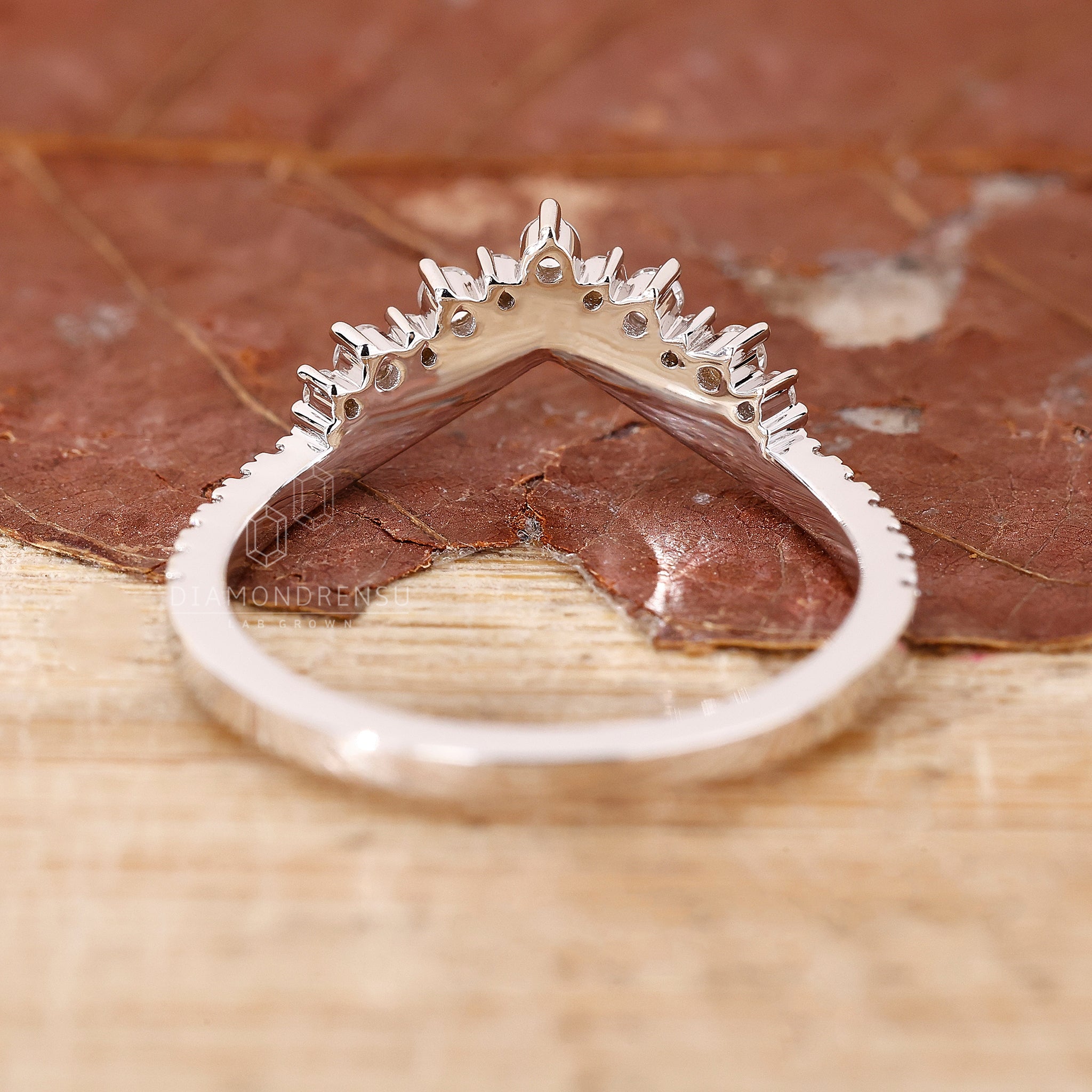 Handmade tiara-style wedding ring.