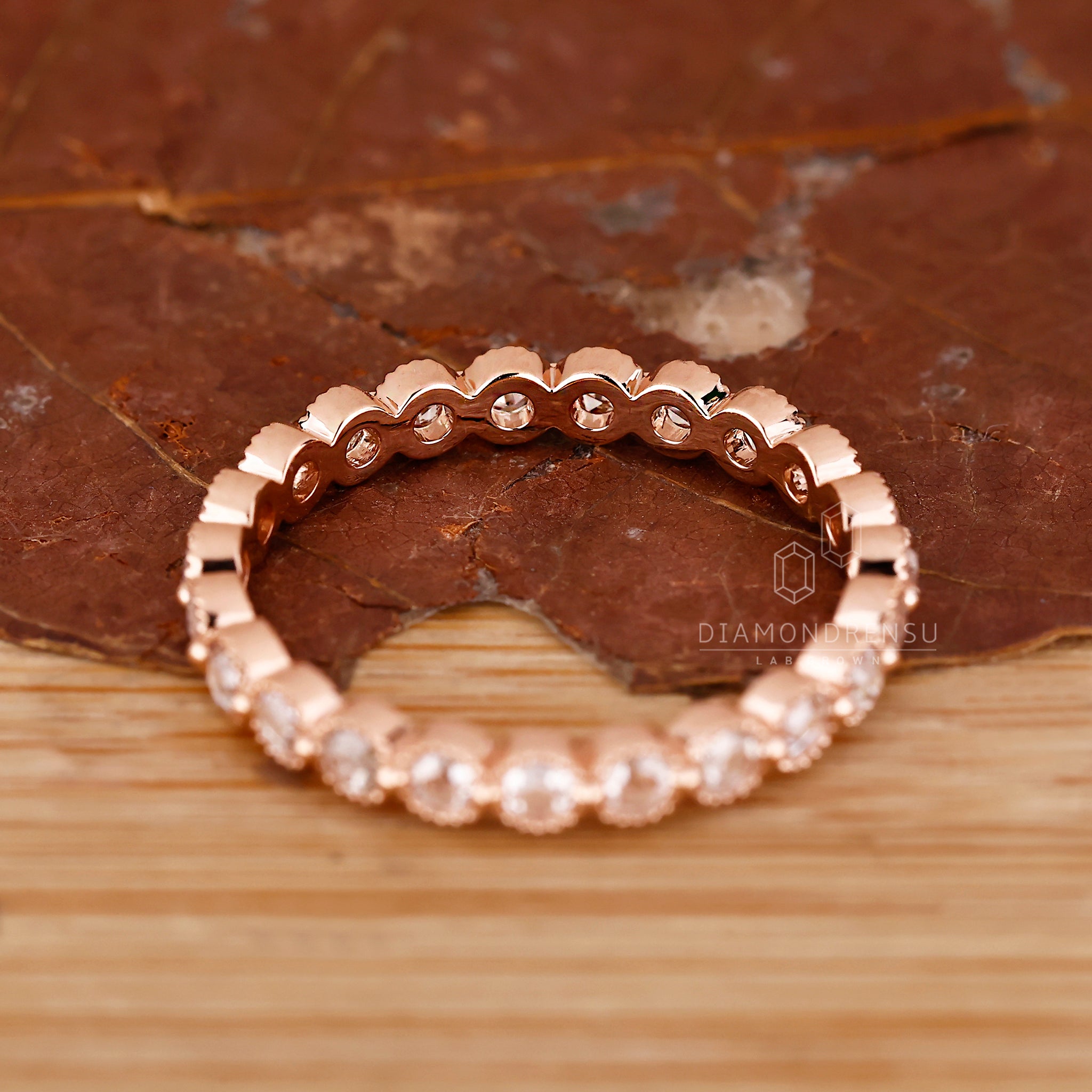 Diamond wedding band in a shared prong setting.