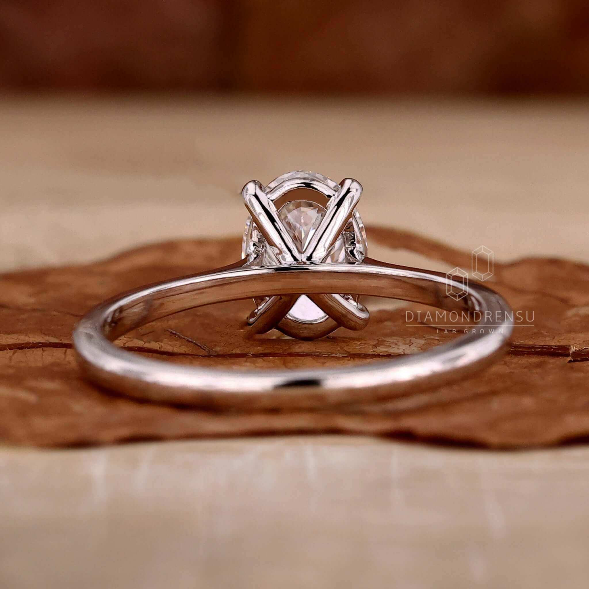 Stunning oval cut diamond engagement ring with unique claw prong setting.