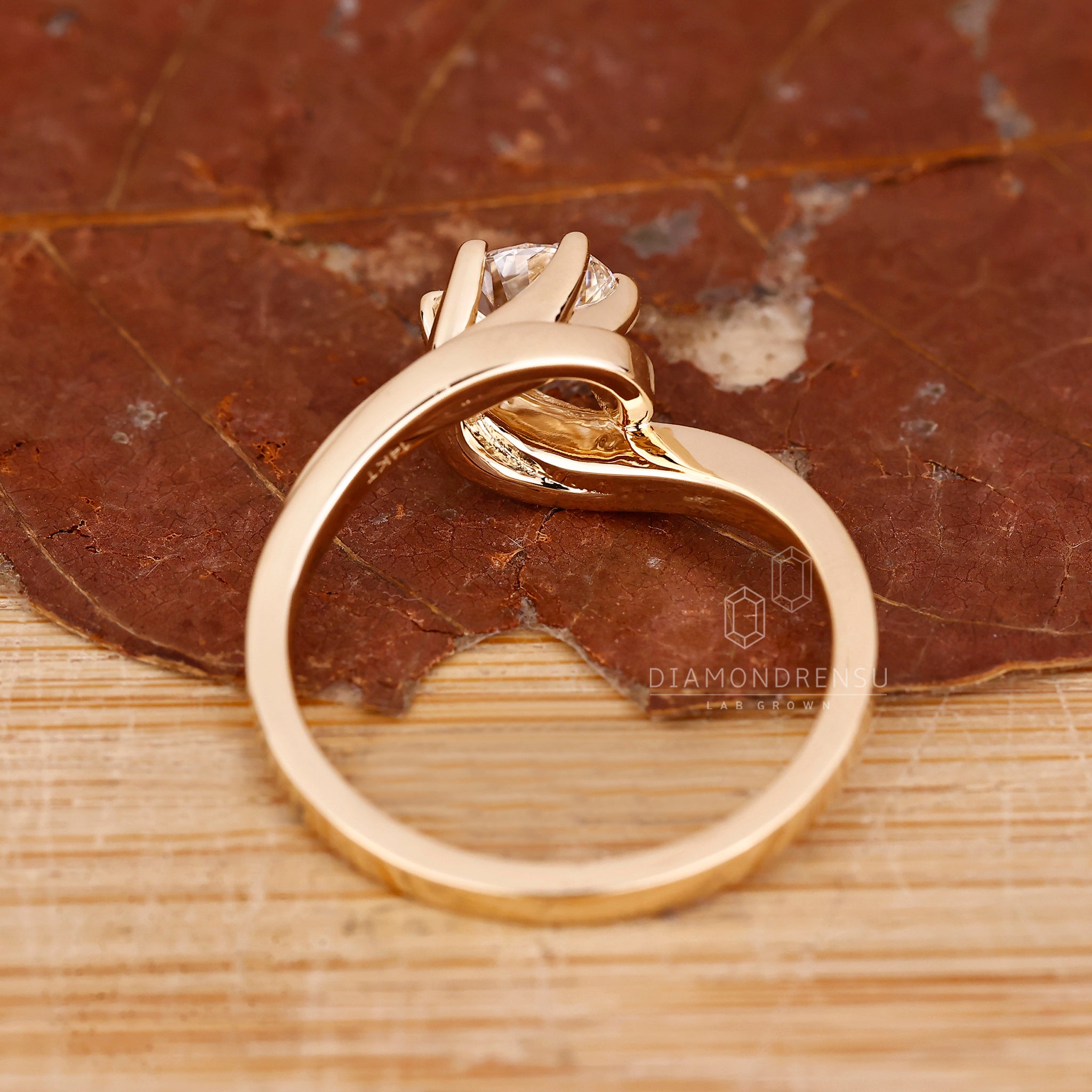Buy engagement ring with bypass and solitaire setting.