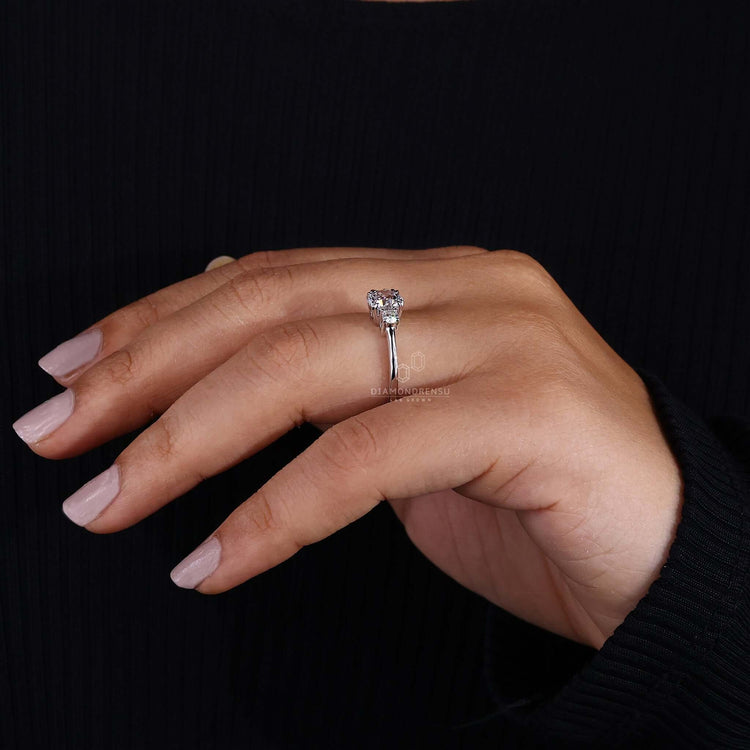 White gold ring with a three stone engagement ring design, offering a beautiful option for modern engagement ring styles.
