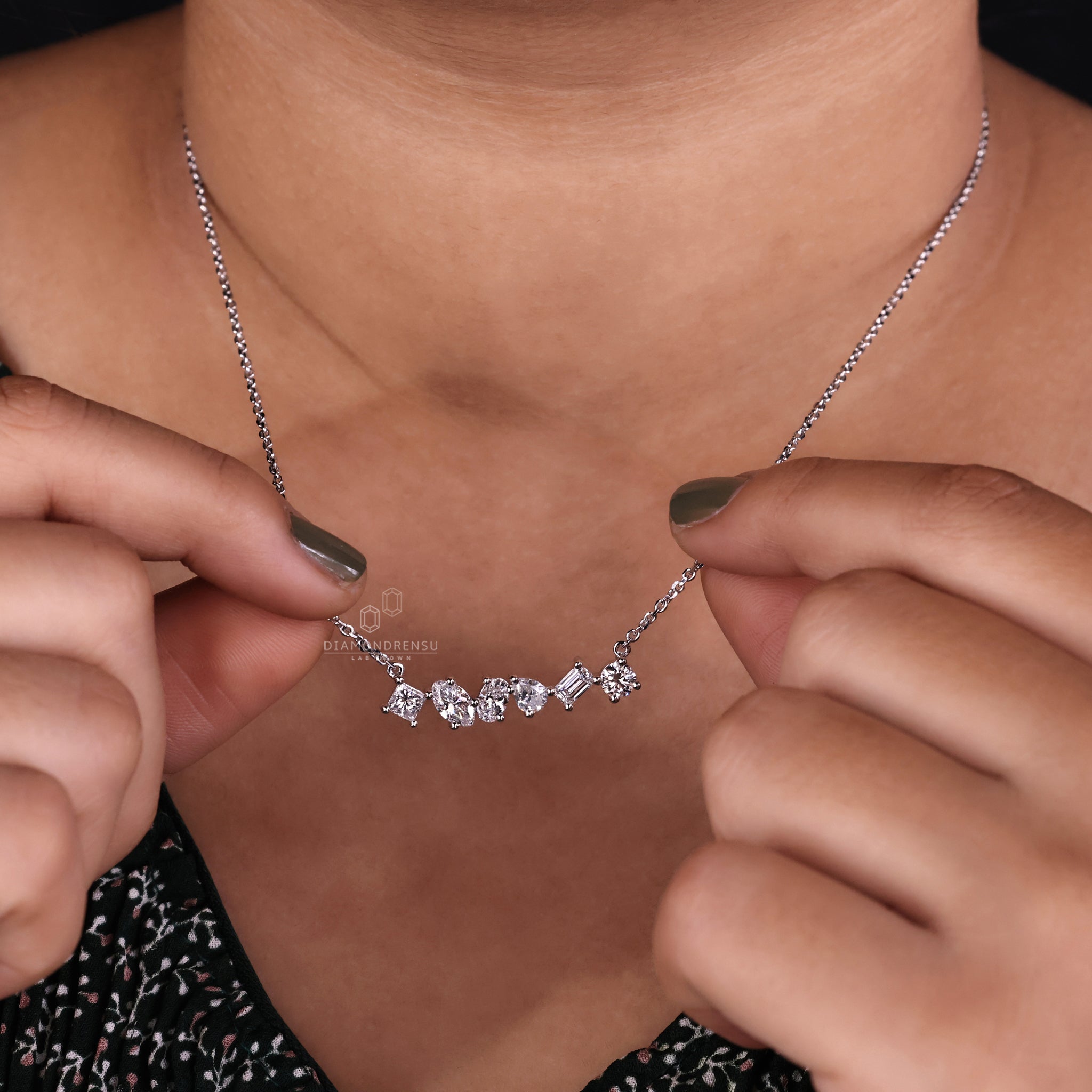 Handmade jewellery pendant designed with unique marquise and pear diamonds.