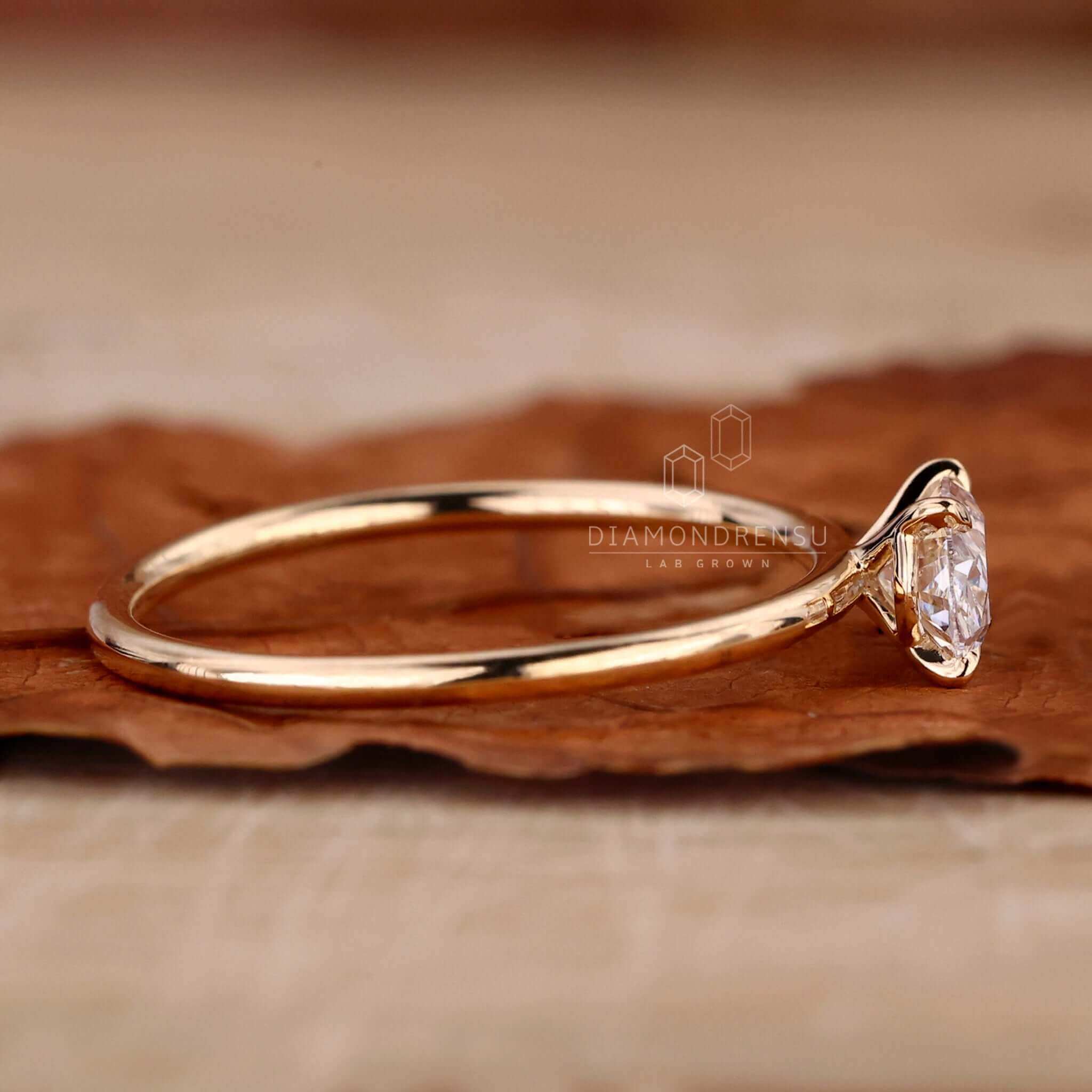 2 carat oval diamond ring with a 4 prong claw setting, ideal for UK engagement traditions.