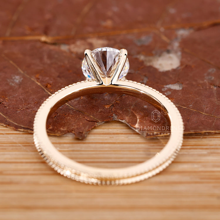 UK engagement ring with round center stone