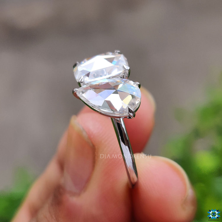 Handmade white gold Toi et Moi engagement ring.