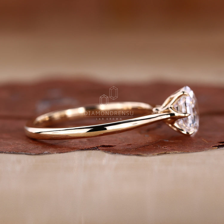 IGI certified solitaire diamond ring in yellow gold.