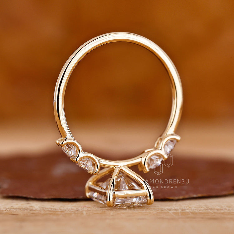 Diamond ring UK includes round and radiant diamonds together.