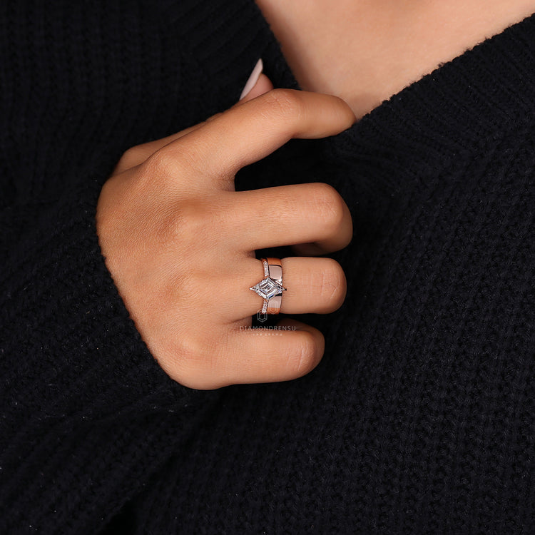 Rose gold bridal set featuring compass prong setting and open gape wedding band.
