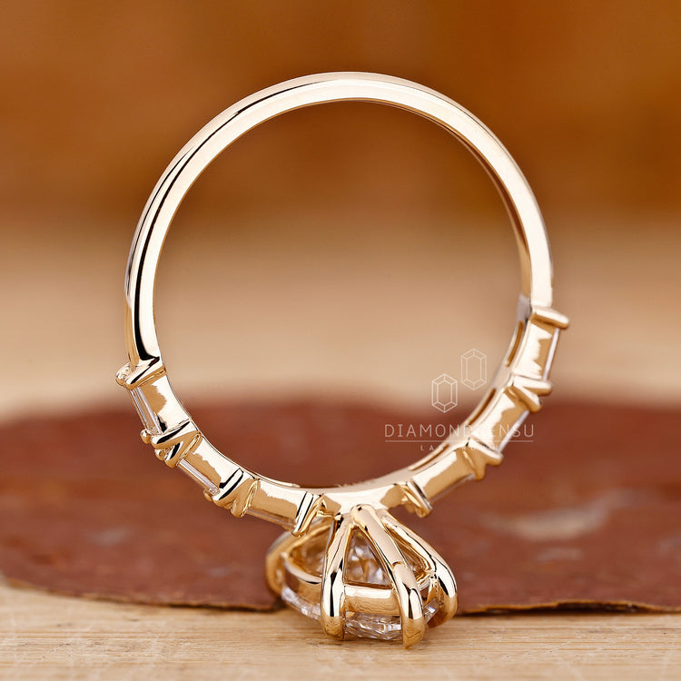 Unique engagement ring made using baguette and marquise cuts.