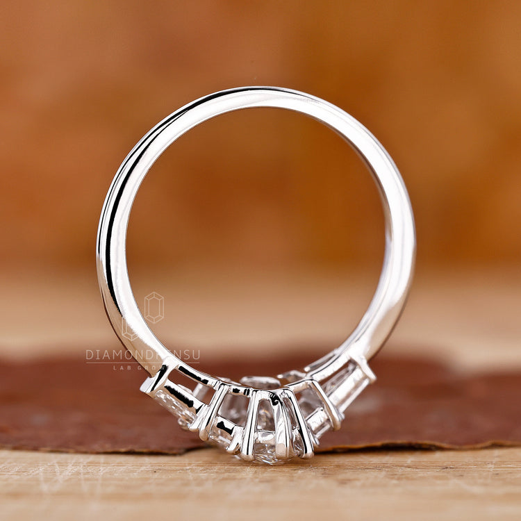 Lab Grown Diamond is used in all five stones of this ring design.